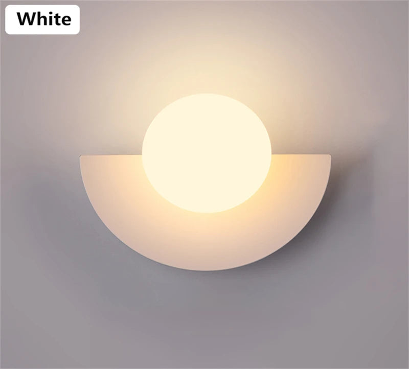 Wall-mounted light fixture with a white finish on a gray background