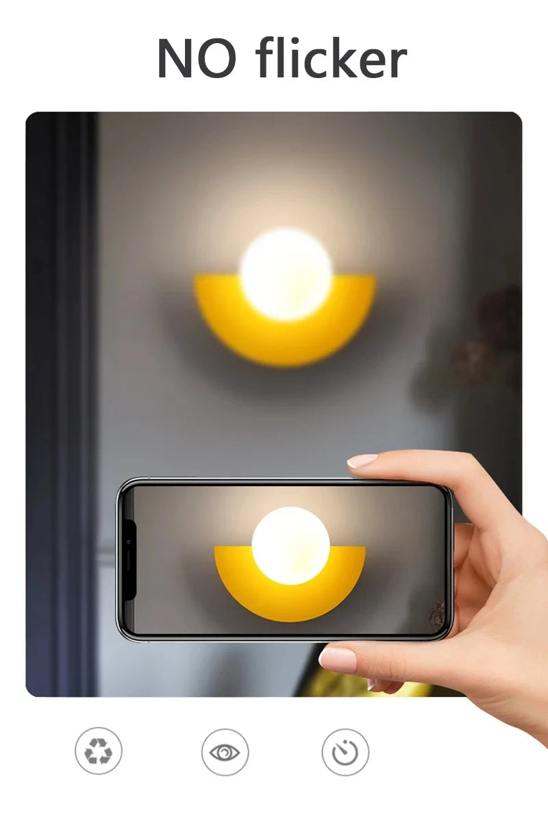 Light fixture with smartphone showing a close-up of the light bulb, labeled 'NO flicker'.
