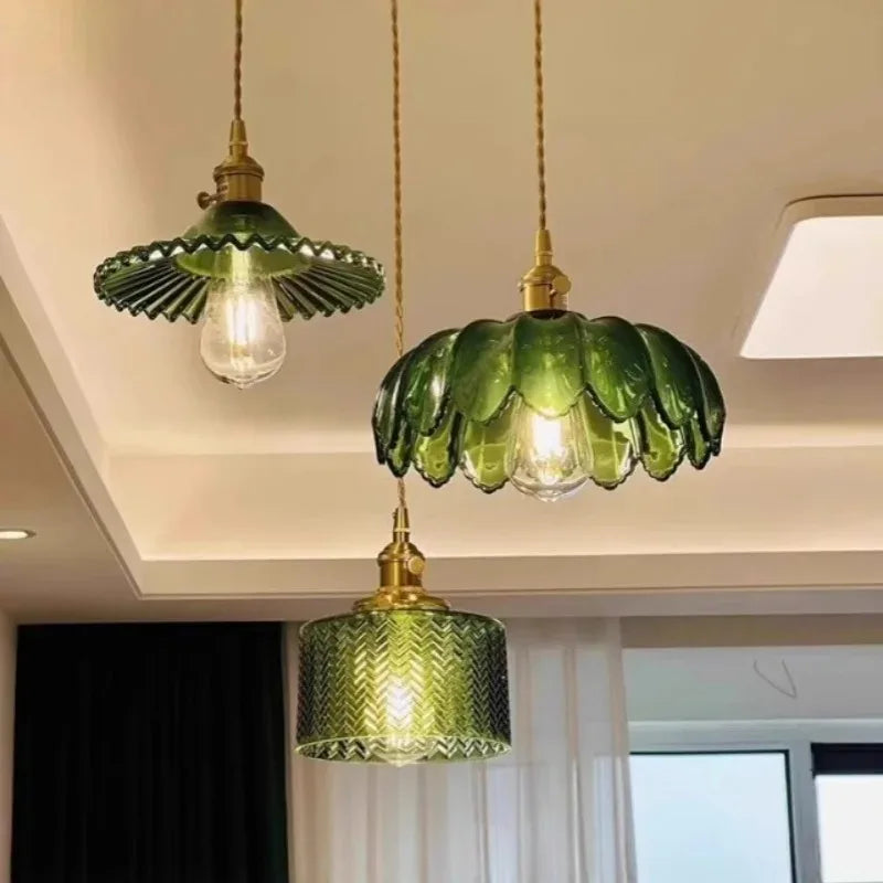 Three green pendant lights hanging from the ceiling.